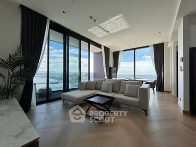 Luxurious living room with panoramic city view and elegant decor
