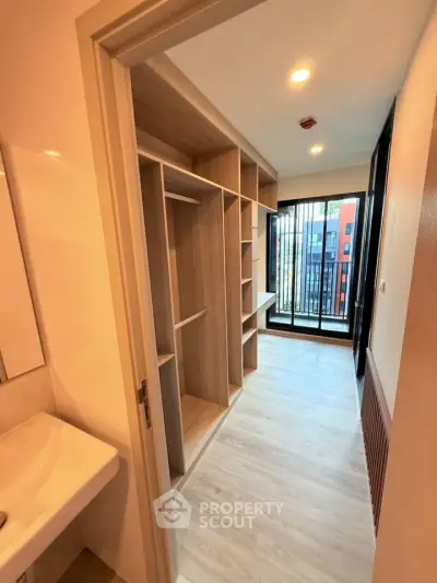 Modern apartment with spacious storage and balcony view