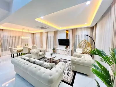 Luxurious living room with elegant furniture and ambient lighting