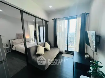Modern apartment living room with balcony and stylish decor