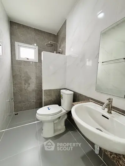 Modern bathroom with sleek fixtures and elegant tile design