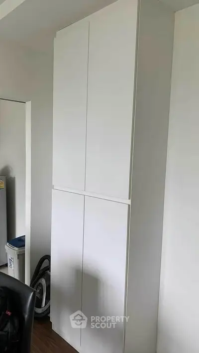 Modern white storage cabinet in a sleek interior space