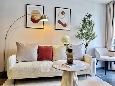 Stylish modern living room with cozy sofa and elegant decor