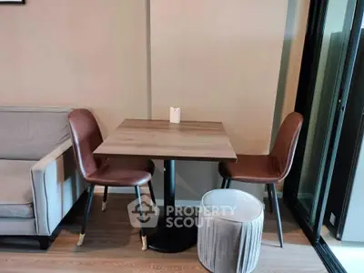 Modern living room with stylish furniture and cozy seating area, perfect for relaxation and entertaining.