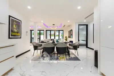 Luxurious modern dining area with marble flooring and elegant decor