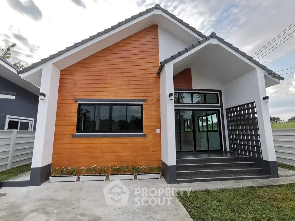 Charming modern house exterior with wooden facade and spacious entrance