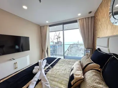 Luxurious bedroom with city view and elegant decor in modern apartment