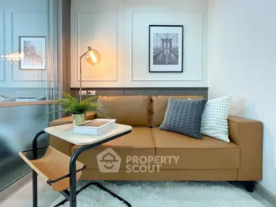 Chic living room with modern decor, cozy sofa, and stylish lighting perfect for urban living.