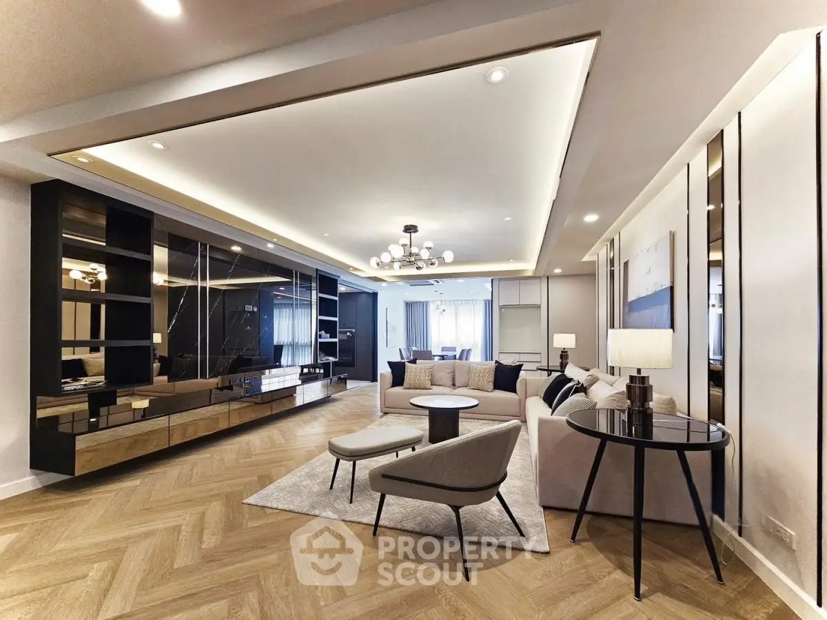 Luxurious modern living room with elegant decor and spacious layout.
