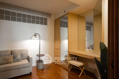 Cozy living room with modern furniture and stylish lighting