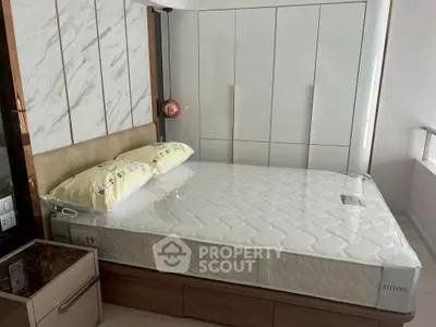 Modern bedroom with stylish decor and spacious wardrobe