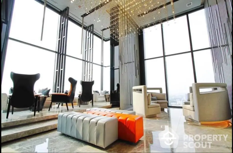 Luxurious high-rise living room with panoramic city views and modern design.