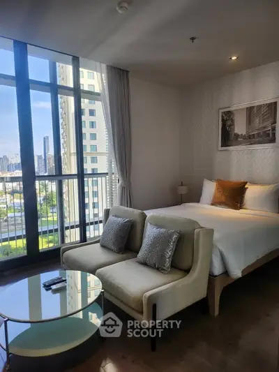 Luxurious bedroom with stunning city view and elegant decor