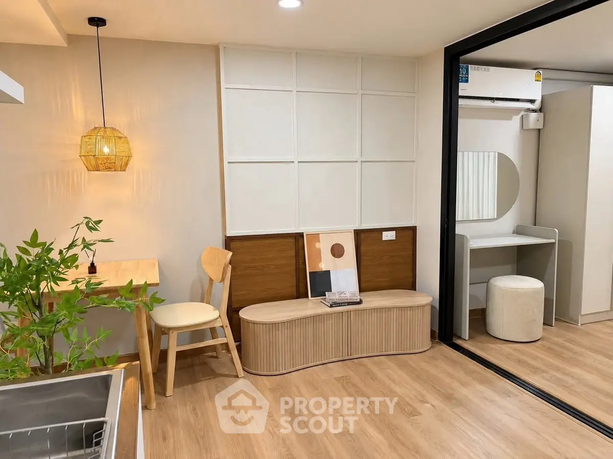 Modern interior with stylish seating and wooden flooring, perfect for cozy living spaces.