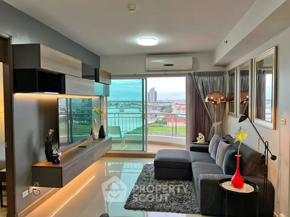 Modern living room with stylish decor and stunning city view from balcony.