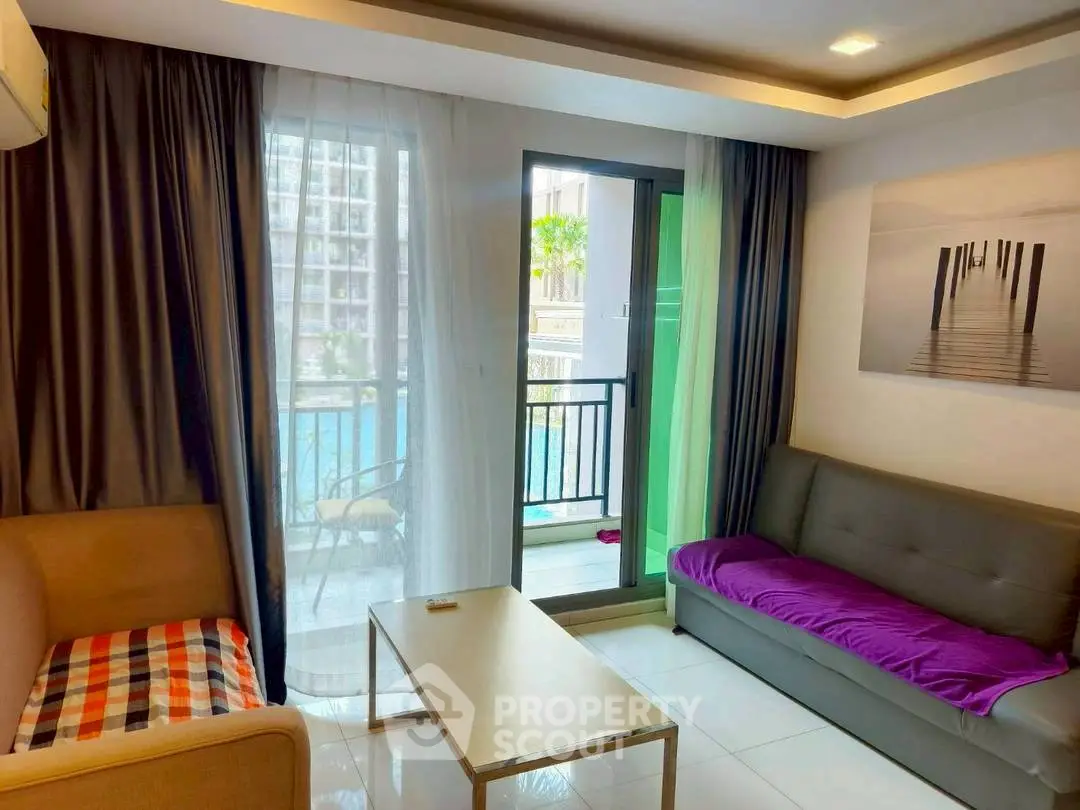 Modern living room with balcony view and stylish furniture