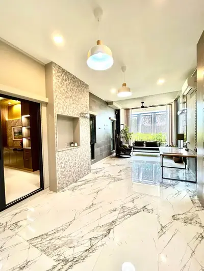 Luxurious modern living room with marble flooring and elegant lighting