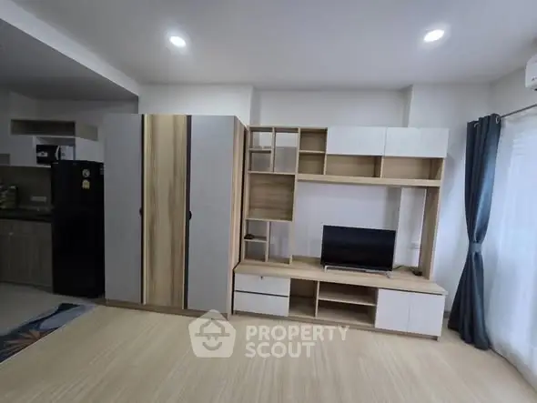 Modern living room with sleek storage and entertainment unit