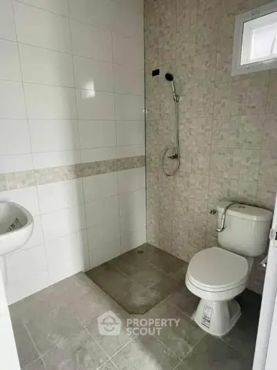 Modern bathroom with shower and toilet in minimalist design
