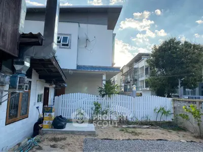 Charming suburban home with fenced yard and modern architecture