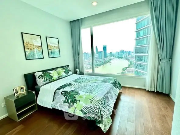Stunning bedroom with panoramic city view and elegant decor