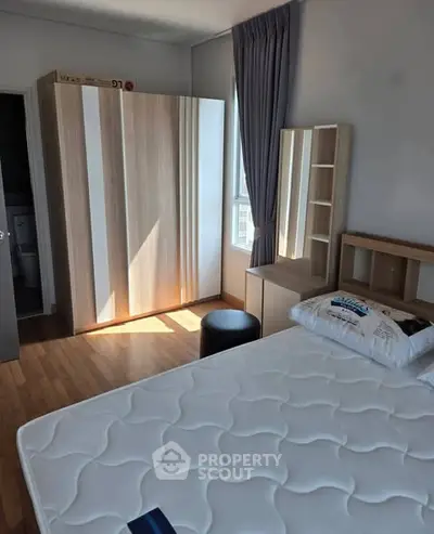 Bright and cozy bedroom with modern furniture and natural light