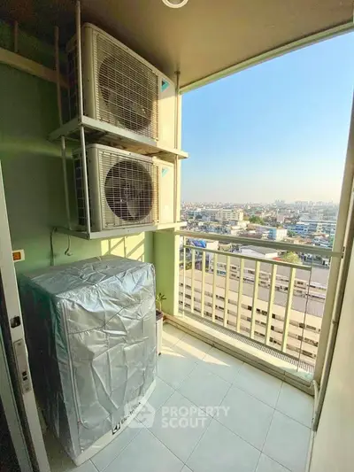 High-rise balcony with city view and air conditioning units, perfect for urban living.