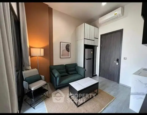 Modern living room with stylish furniture and air conditioning in a cozy apartment.