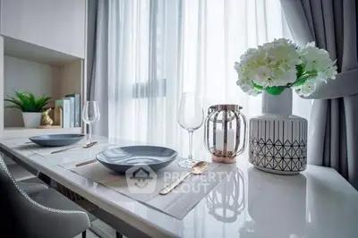 Elegant dining area with modern decor and natural light