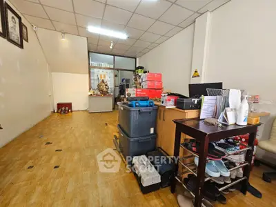 Spacious storage room with organized shelves and ample lighting