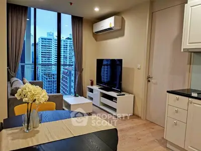Modern living room with city view, stylish furniture, and air conditioning