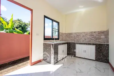 Bright kitchen with modern design and outdoor access