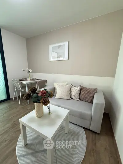 Modern living room with cozy sofa and stylish decor in a bright apartment