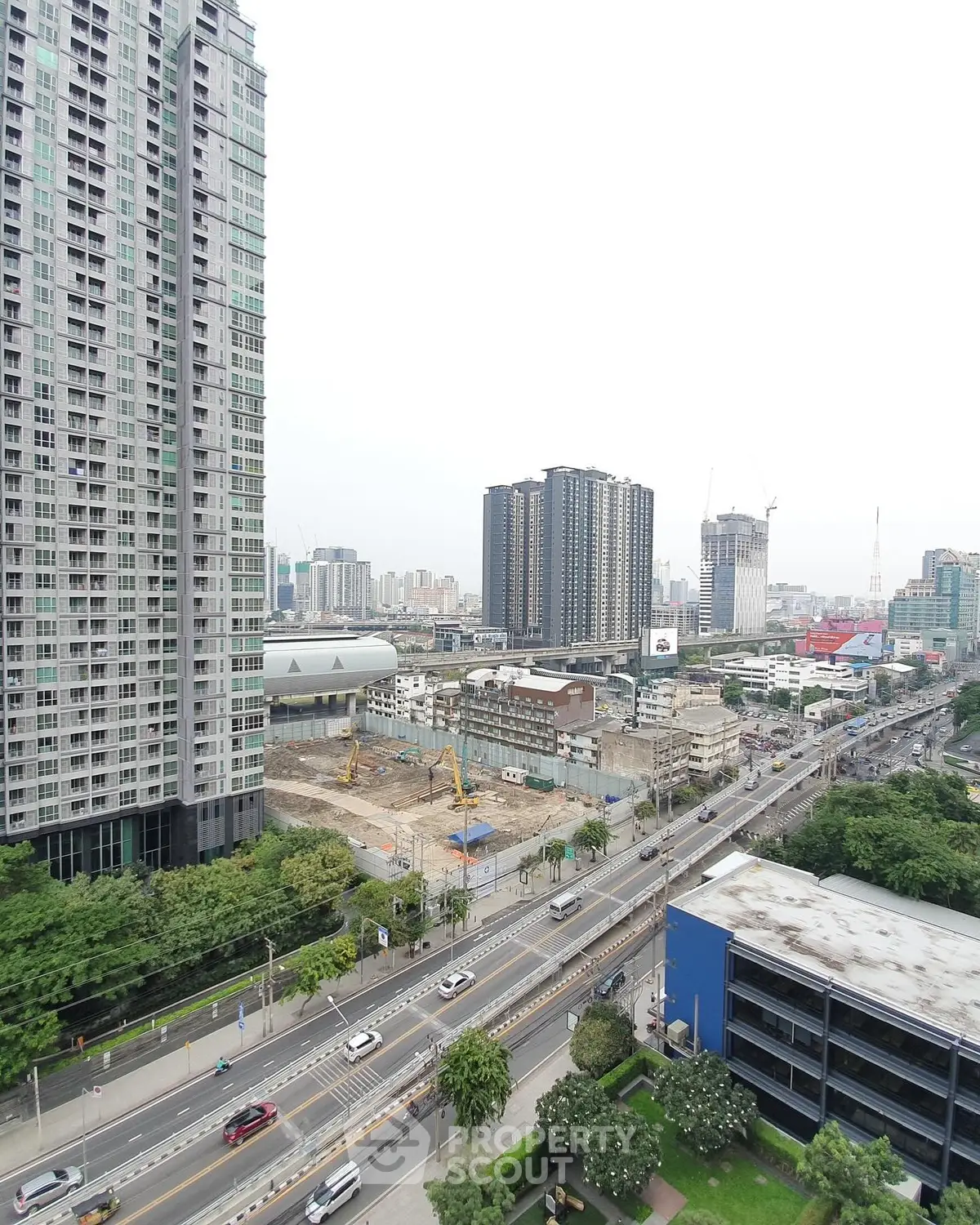 Stunning cityscape view with high-rise buildings and bustling streets, perfect for urban living.