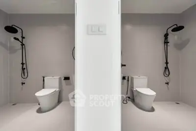 Modern dual bathroom setup with sleek fixtures and minimalist design.