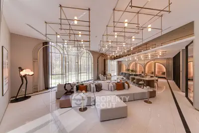 Luxurious modern living room with elegant lighting and spacious seating area.
