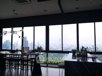 Luxurious penthouse with panoramic city skyline view and modern interior design.