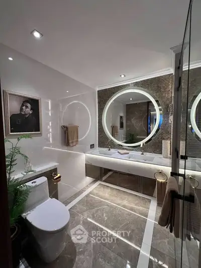 Luxurious modern bathroom with elegant lighting and stylish decor