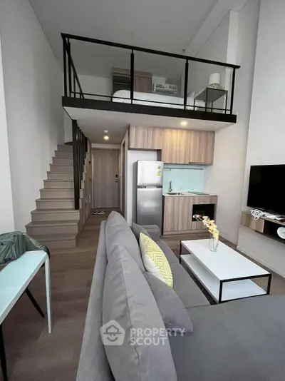 Modern loft apartment with stylish mezzanine and open kitchen layout