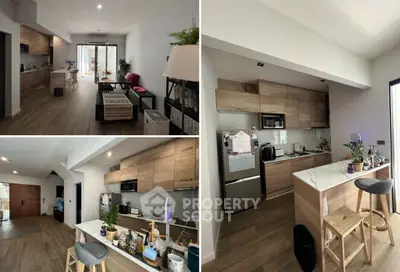 Modern kitchen with open layout and stylish wooden cabinetry