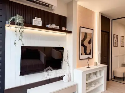 Modern living room with stylish decor and wall-mounted TV