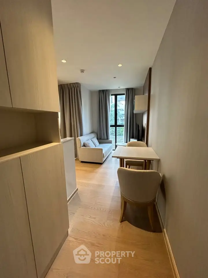 Modern living room with cozy seating and natural light