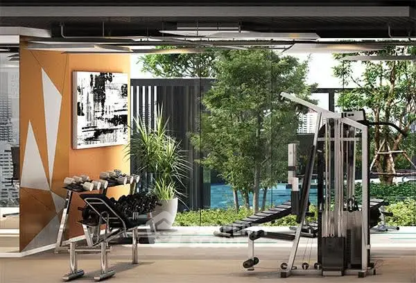 Modern gym with state-of-the-art equipment and lush garden view