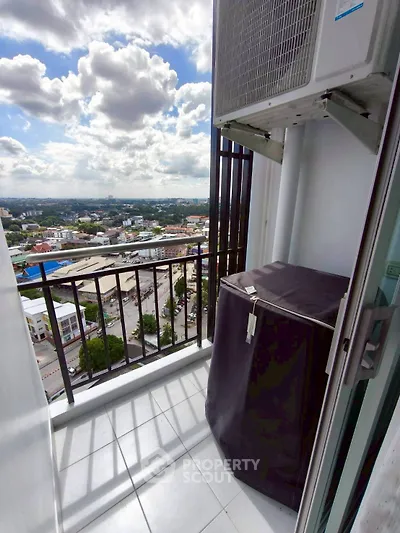Stunning balcony view with cityscape and sky, perfect for relaxation.