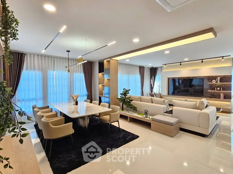 Luxurious modern living room with elegant dining area and stylish decor