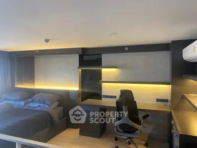 Modern bedroom with sleek workspace and ambient lighting