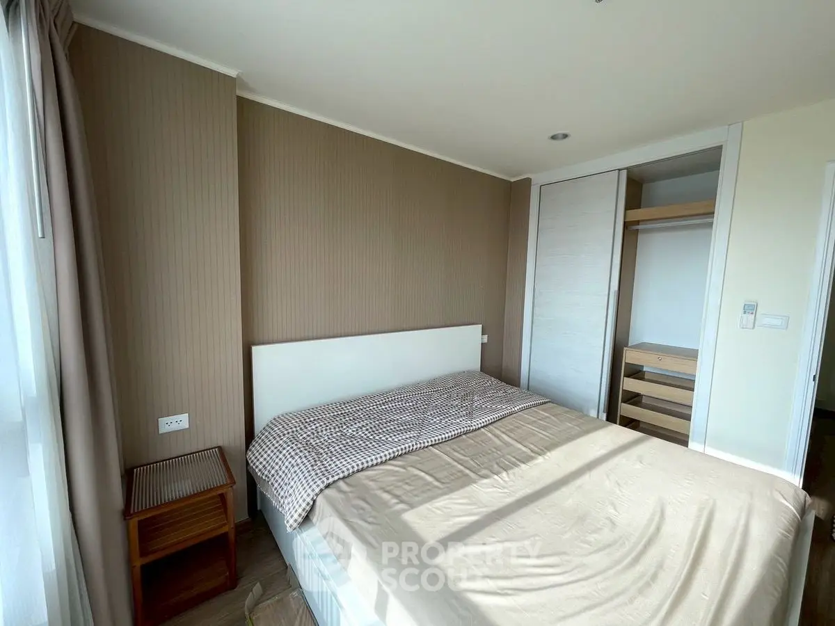 Bright and cozy bedroom with modern design and ample natural light