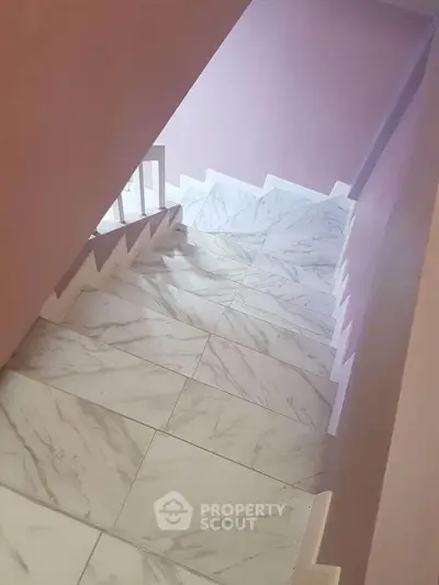 Elegant marble staircase with modern design in a stylish home interior