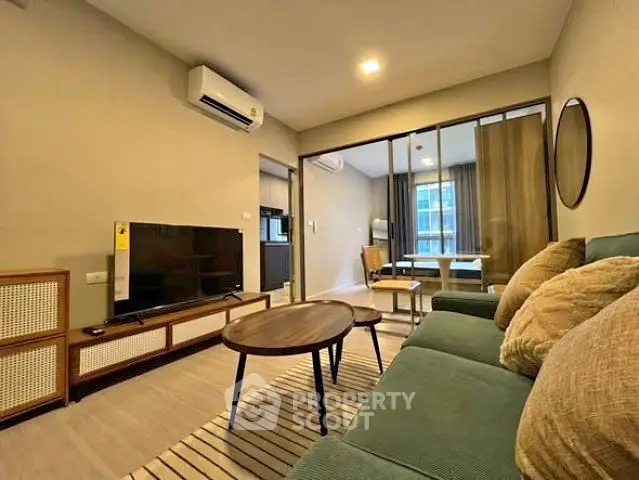 Modern living room with stylish furniture and open layout, perfect for urban living.