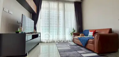 Modern living room with large window and stylish decor